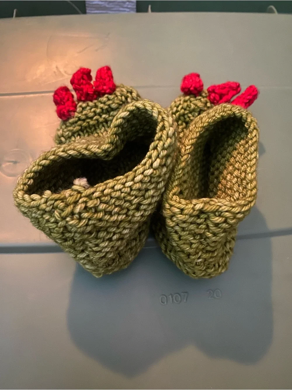 Hand-Knit Green Baby Booties with Red Claw Details